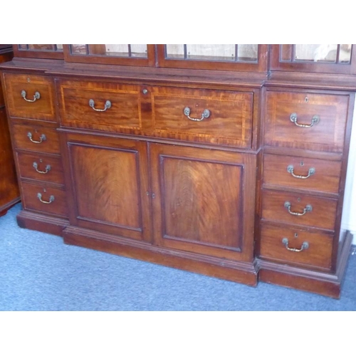 903 - A very fine late 18th century breakfront mahogany library secretaire bookcase; the dentil cornice ab... 