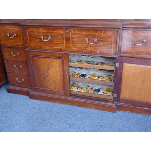 903 - A very fine late 18th century breakfront mahogany library secretaire bookcase; the dentil cornice ab... 