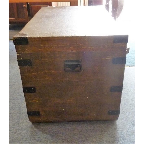 916 - A large iron-mounted scumble-finish pine chest with two side carrying handles, the hinged lid liftin... 