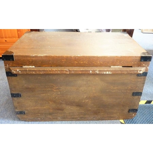 916 - A large iron-mounted scumble-finish pine chest with two side carrying handles, the hinged lid liftin... 