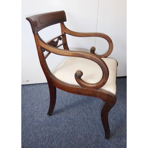 934 - A good set of seven (5+2) Regency-period mahogany dining chairs; the two carvers with concave, table... 