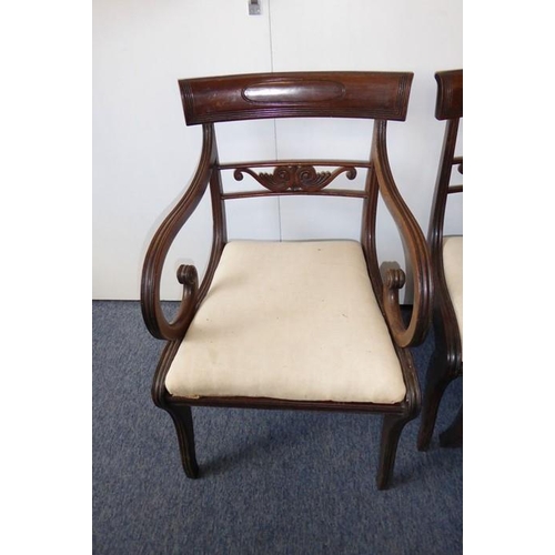 934 - A good set of seven (5+2) Regency-period mahogany dining chairs; the two carvers with concave, table... 