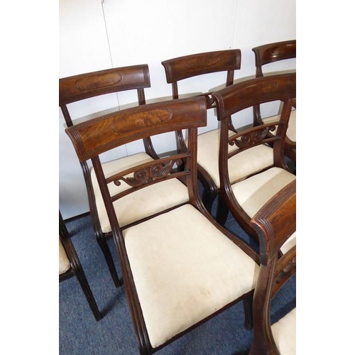 934 - A good set of seven (5+2) Regency-period mahogany dining chairs; the two carvers with concave, table... 