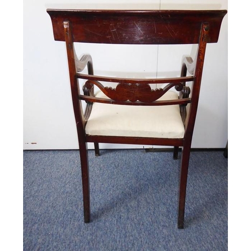 934 - A good set of seven (5+2) Regency-period mahogany dining chairs; the two carvers with concave, table... 