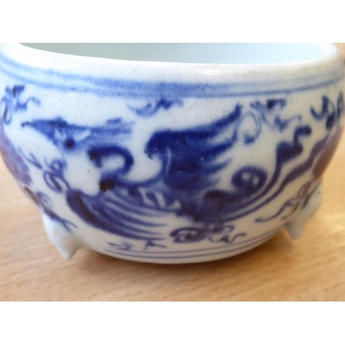 94 - A Yuan Dynasty blue and white Chinese three-footed porcelain censer decorated with three phoenix (on... 