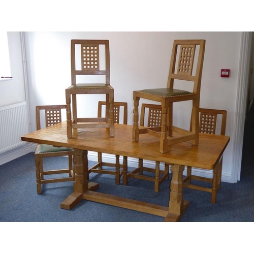 946 - A fine Robert 'Mouseman' Thompson of Kilburn refectory dining table together with six lattice back c... 