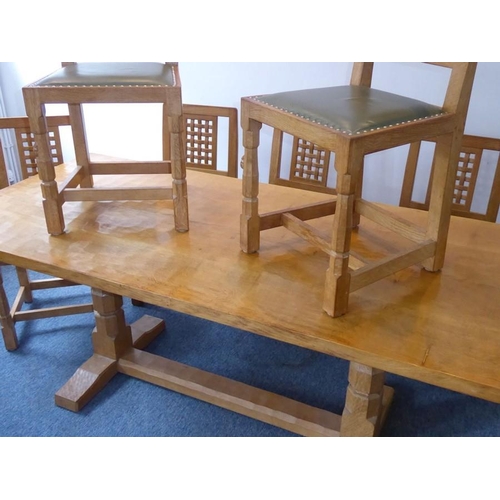 946 - A fine Robert 'Mouseman' Thompson of Kilburn refectory dining table together with six lattice back c... 