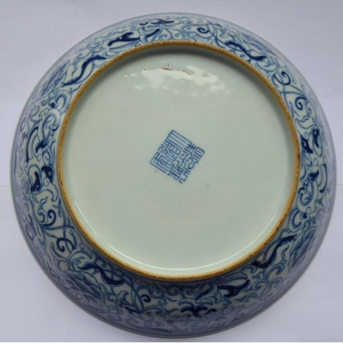 97 - A circular Chinese porcelain blue and white dish; six character mark of Daoguang and possibly of the... 