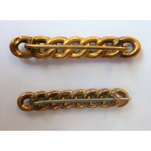 259 - Two 19th century chain-style 9-carat gold stick pins (the largest 4.5cm)