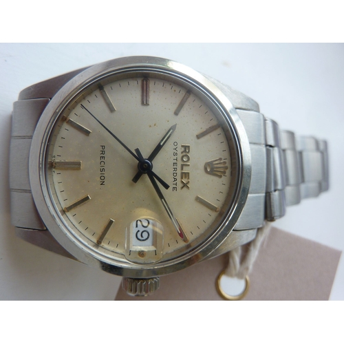 391 - A steel-cased Rolex Oysterdate Precision wristwatch; the cream-coloured dial signed and with baton m... 