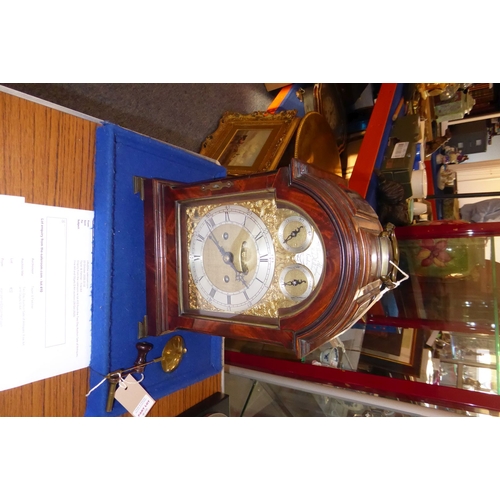 410 - A fine 18th century figured mahogany cased eight-day repeating bracket clock; the broken-arch dial h... 