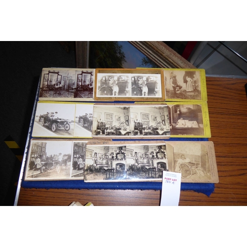 500A - An early 20th century stereoscopic viewer having an array of original monochrome cardboard slides to... 