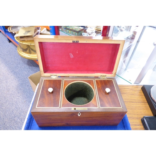 553 - A George III period rectangular mahogany two-division tea caddy with silver-plated handle, boxwood-s... 