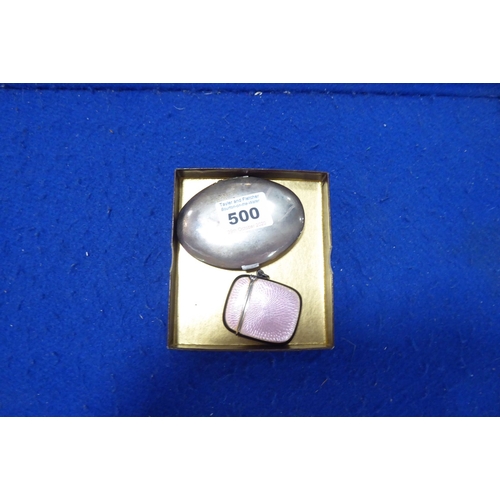 500 - A late 19th/early 20th century silver (marked 925) and pink guilloche enamel vesta case together wit... 