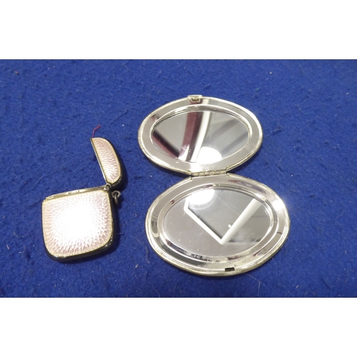 500 - A late 19th/early 20th century silver (marked 925) and pink guilloche enamel vesta case together wit... 