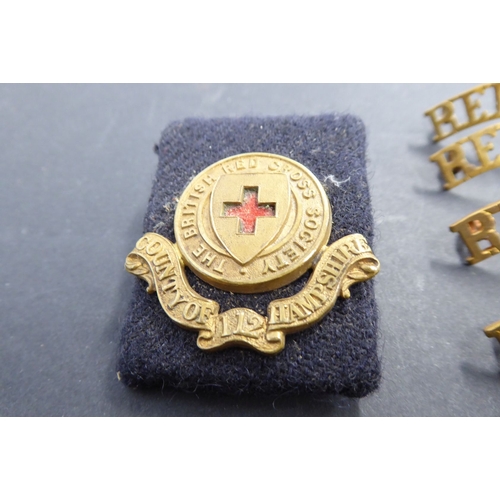 742 - A selection of enamel Red Cross and other awards and badges, one marked 'Zoe Beaver'; together with ... 