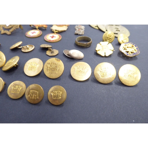 742 - A selection of enamel Red Cross and other awards and badges, one marked 'Zoe Beaver'; together with ... 