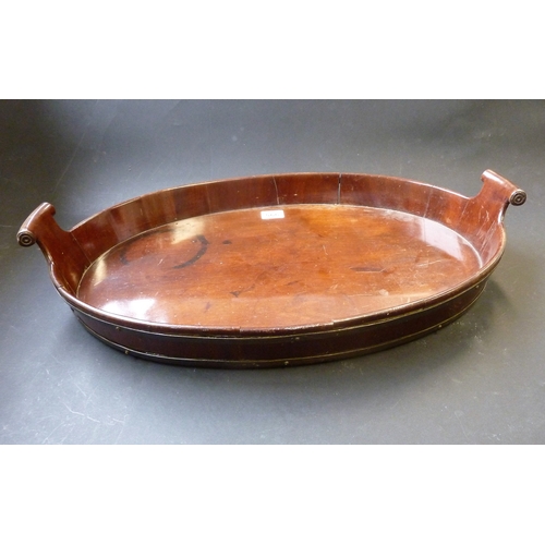 566 - An 18th century style oval mahogany two-handled serving tray coopered with two brass bands, small ci... 