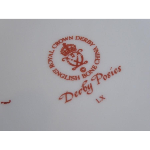 11 - A selection of Royal Crown Derby teawares in the 'Derby Posies' pattern; to include a large plate, a... 