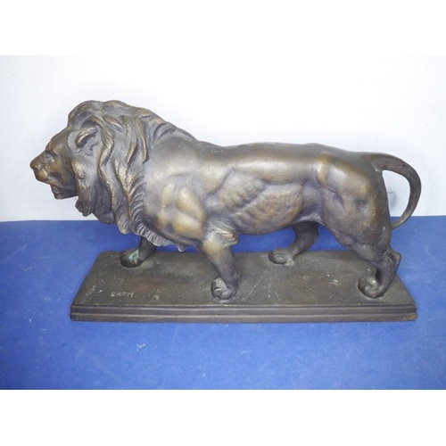 12 - Eight green glazed ceramic animals including dogs, a cat and an open-winged bird (the tallest 46.5cm... 