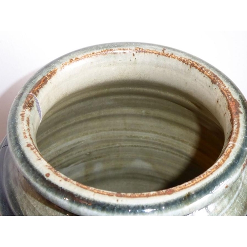 13 - Richard BATTERHAM (b. 1936); a large Studio-ware style stoneware jar of faceted barrel form, green g... 