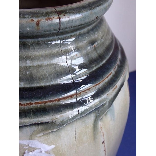 13 - Richard BATTERHAM (b. 1936); a large Studio-ware style stoneware jar of faceted barrel form, green g... 