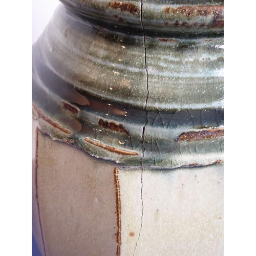13 - Richard BATTERHAM (b. 1936); a large Studio-ware style stoneware jar of faceted barrel form, green g... 
