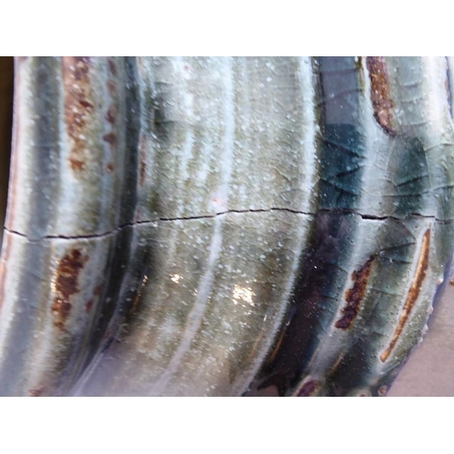 13 - Richard BATTERHAM (b. 1936); a large Studio-ware style stoneware jar of faceted barrel form, green g... 