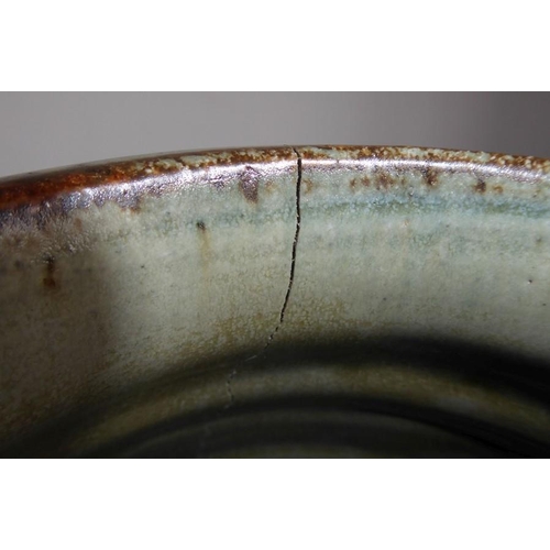 13 - Richard BATTERHAM (b. 1936); a large Studio-ware style stoneware jar of faceted barrel form, green g... 