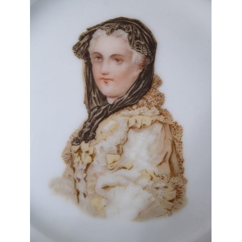 16 - Four similarly sized collector's plates: the largest being a 19th century Majolica example (23.4cm i... 