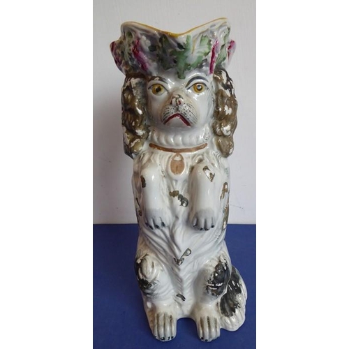 20 - A selection of ceramics to include an unusual 19th century Staffordshire Potteries jug modelled as a... 