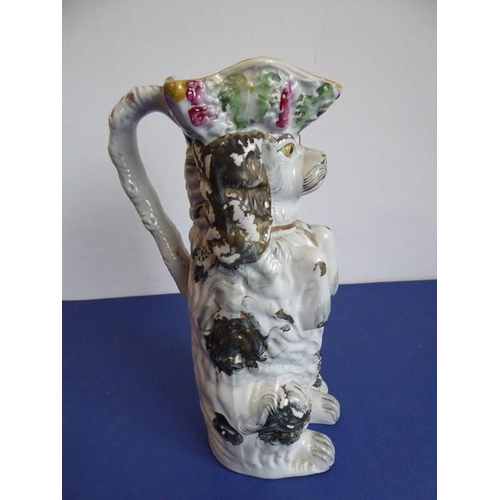 20 - A selection of ceramics to include an unusual 19th century Staffordshire Potteries jug modelled as a... 