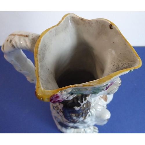 20 - A selection of ceramics to include an unusual 19th century Staffordshire Potteries jug modelled as a... 