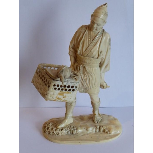 240 - A very finely carved Japanese Meiji period ivory carving depicting a male figure holding a woven wic... 