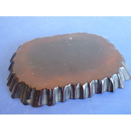 240 - A very finely carved Japanese Meiji period ivory carving depicting a male figure holding a woven wic... 