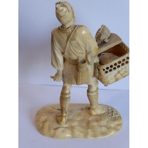 240 - A very finely carved Japanese Meiji period ivory carving depicting a male figure holding a woven wic... 