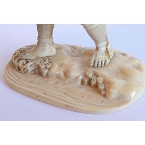 240 - A very finely carved Japanese Meiji period ivory carving depicting a male figure holding a woven wic... 