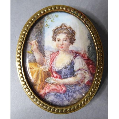 242 - A late 19th century portrait miniature of a young lady in a pinchbeck frame