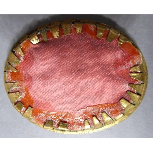 242 - A late 19th century portrait miniature of a young lady in a pinchbeck frame