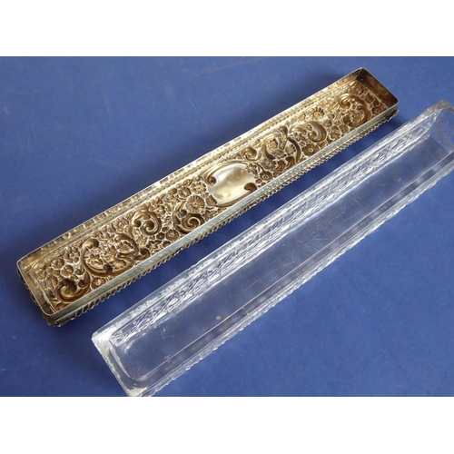 29 - A long rectangular cut-glass lady's dressing table requisite box having silver-mounted lid (small do... 