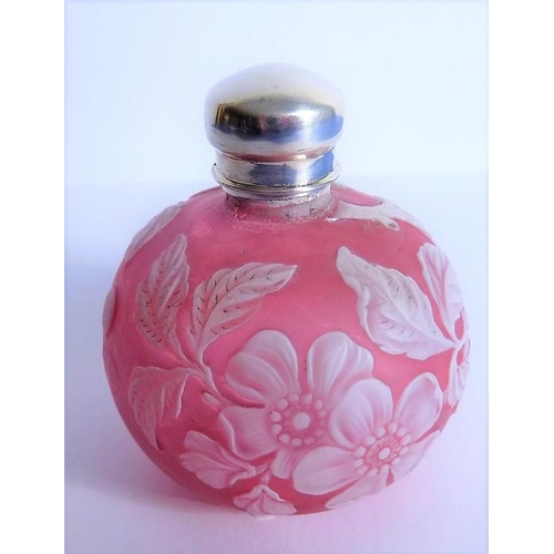 31 - A 19th century cameo glass perfume bottle by Thomas Webb of Stourbridge; heavy white floral decorati... 