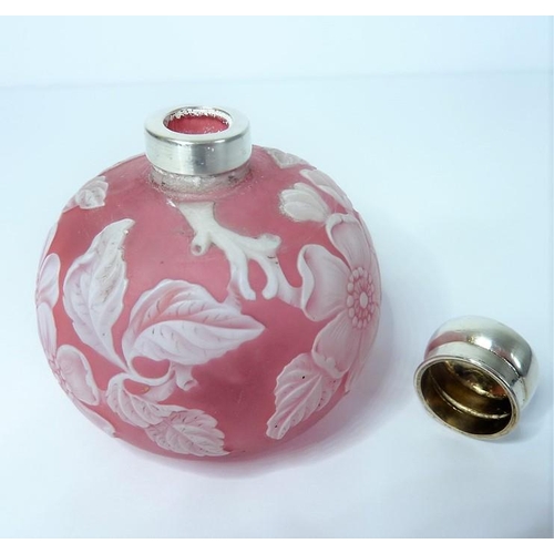 31 - A 19th century cameo glass perfume bottle by Thomas Webb of Stourbridge; heavy white floral decorati... 