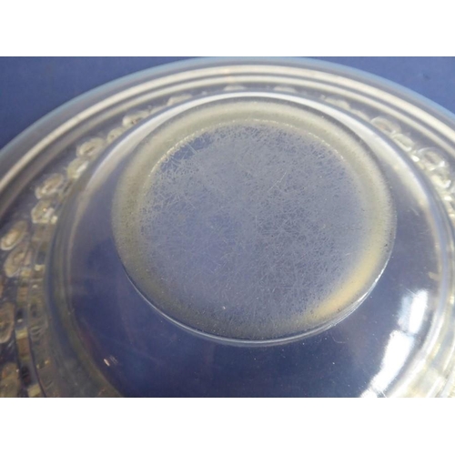 32 - A large and heavy Art Deco period circular glass bowl with opalescent rim and inner border of half s... 