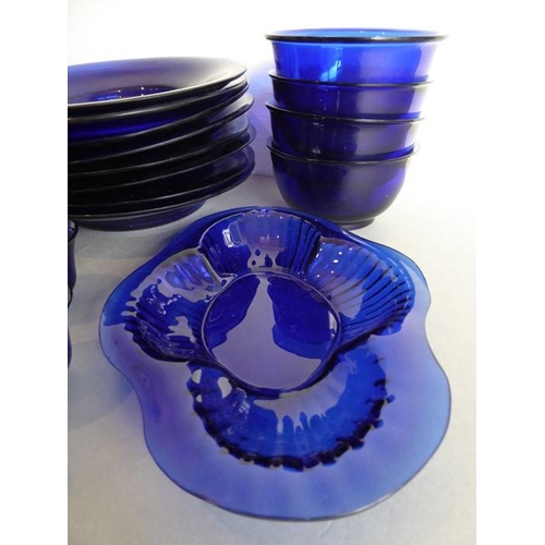 39 - A 25-piece cobalt-blue-glass service; (probably mid-20th century Chinese) comprising eight circular ... 