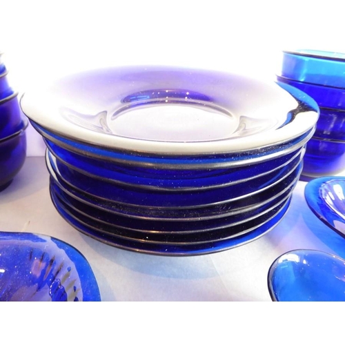 39 - A 25-piece cobalt-blue-glass service; (probably mid-20th century Chinese) comprising eight circular ... 