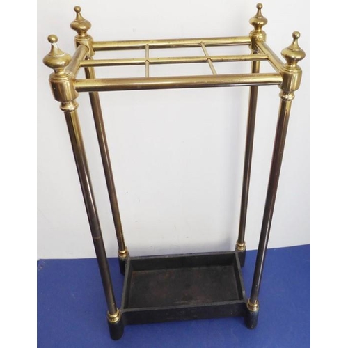 47 - An early 20th century six-division brass stick-stand with iron base (62cm high); together with two u... 