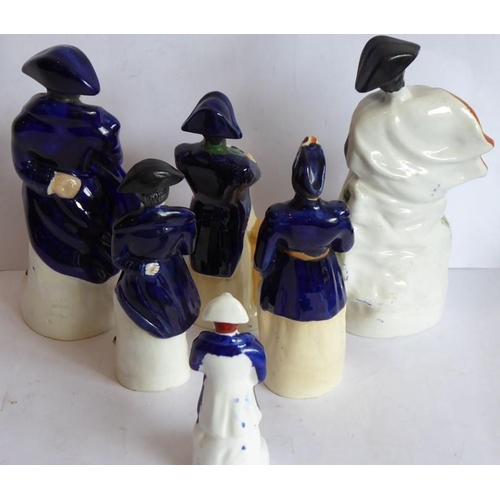 5 - Six varying sized hand-decorated Staffordshire figure models of Napoleon; the tallest (with hole to ... 
