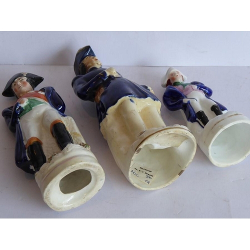 5 - Six varying sized hand-decorated Staffordshire figure models of Napoleon; the tallest (with hole to ... 