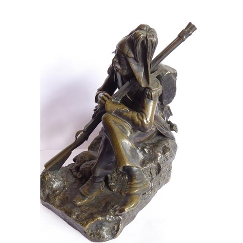 53 - A good and heavy 19th century patinated bronze sculpture of a Napoleon Grenadier with his dog and gu... 