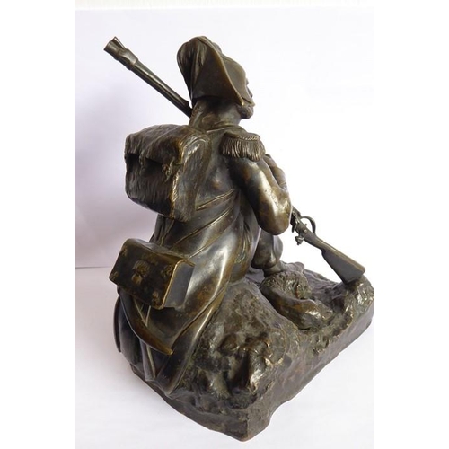 53 - A good and heavy 19th century patinated bronze sculpture of a Napoleon Grenadier with his dog and gu... 
